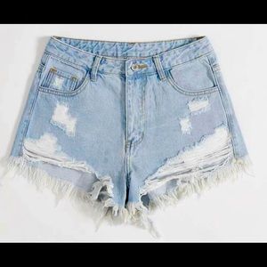Ripped denim shorts